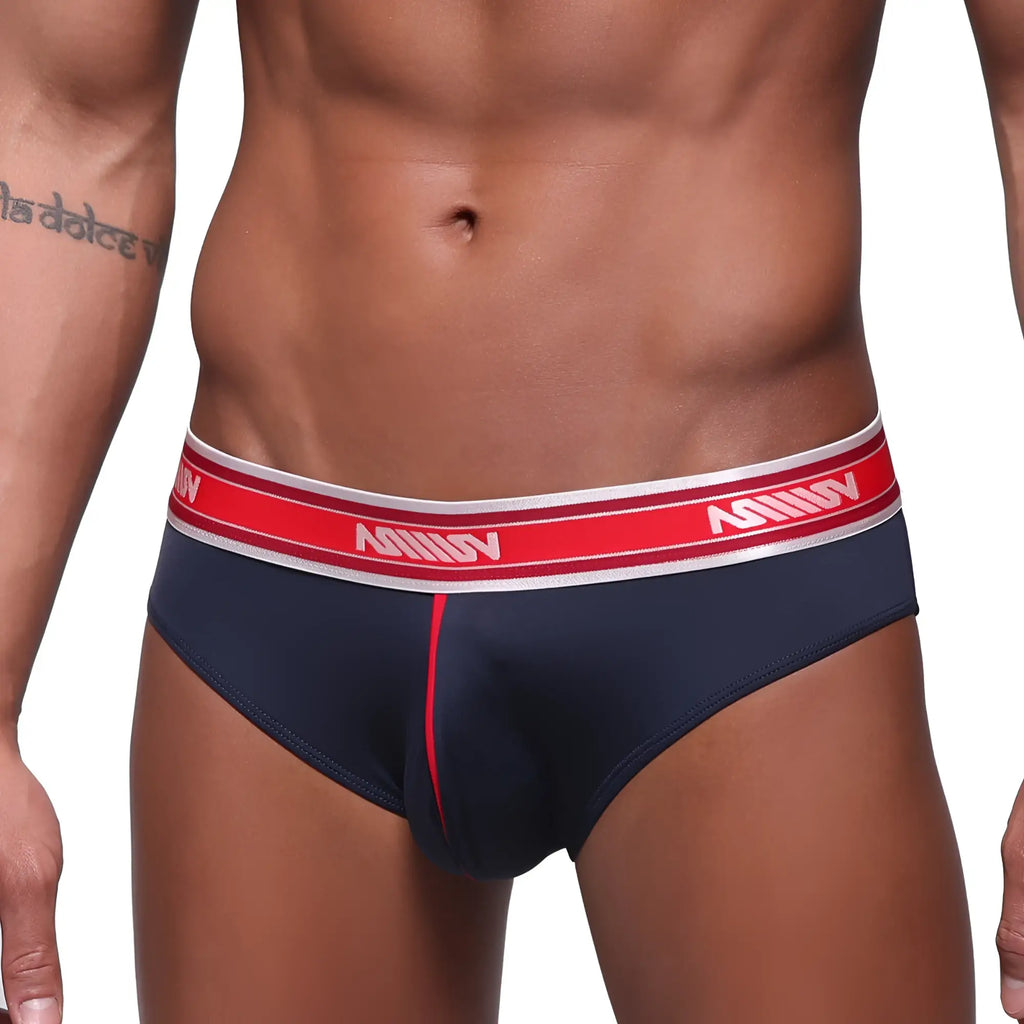 Navy blue MetroMaleWear Mirage bikini briefs with red and white elastic waistband featuring anhuv logo in bold white lettering