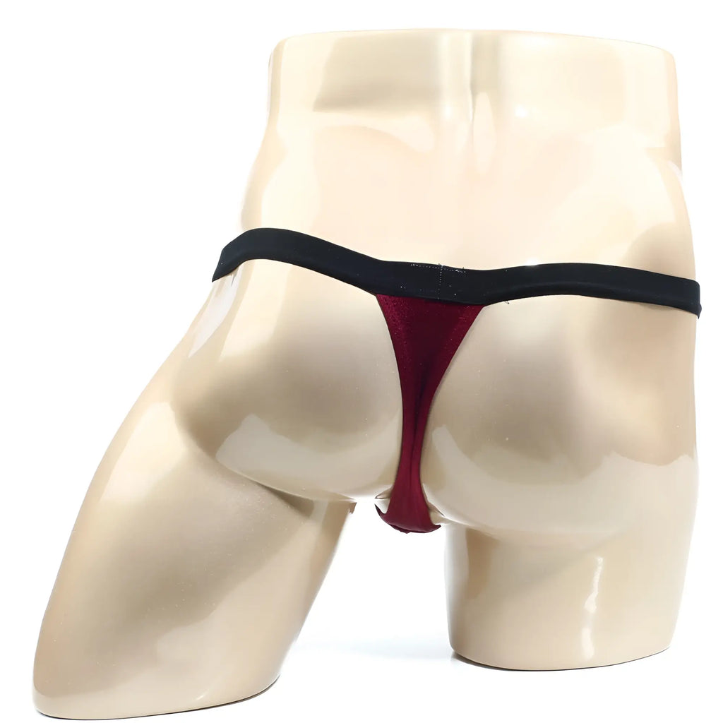 A sleek deep red thong with a black elastic waistband from metromalewear modernizing thong burgundy 3002-m29