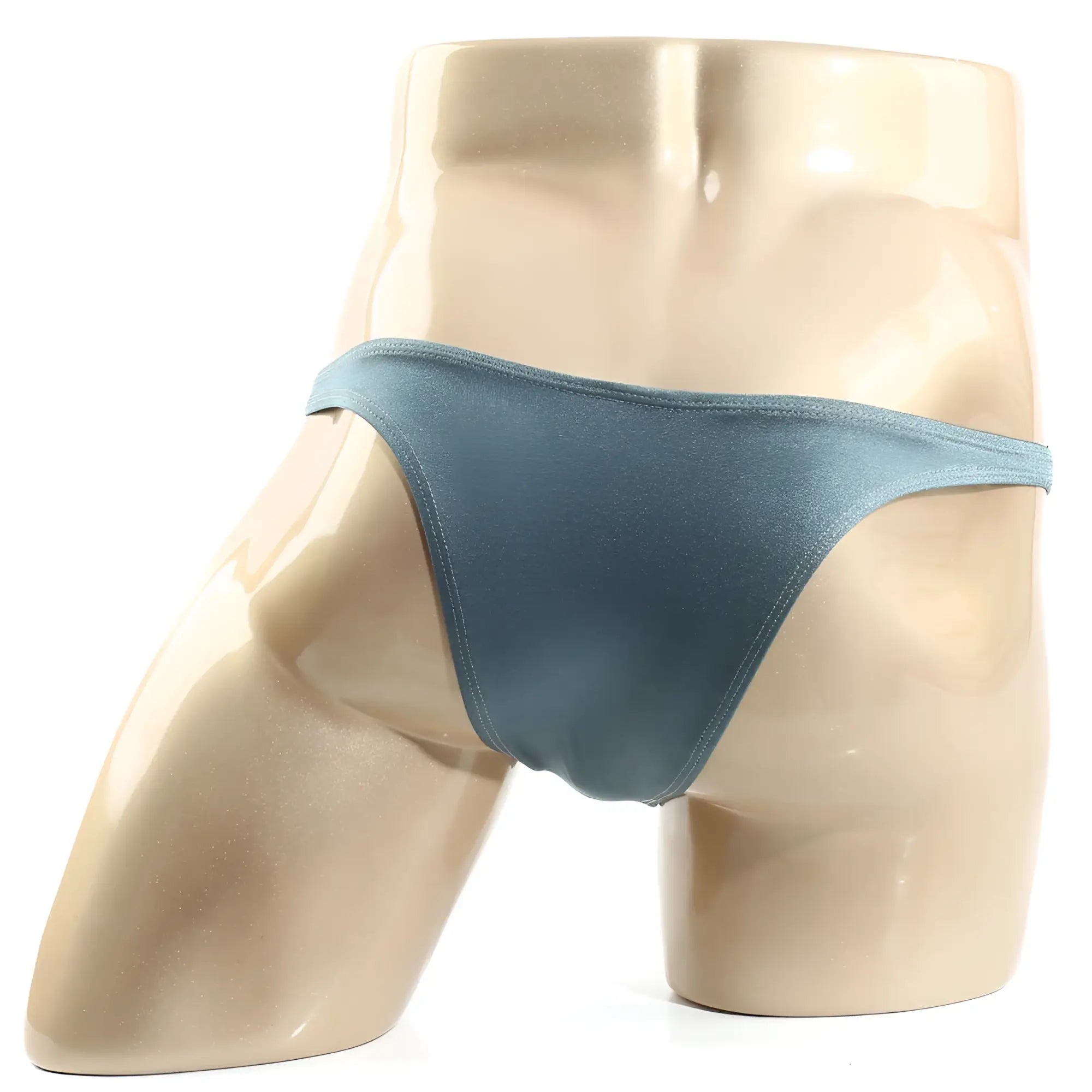 A sleek matte teal metroMalewear monaco bikini thong made of smooth fabric with a minimalist design