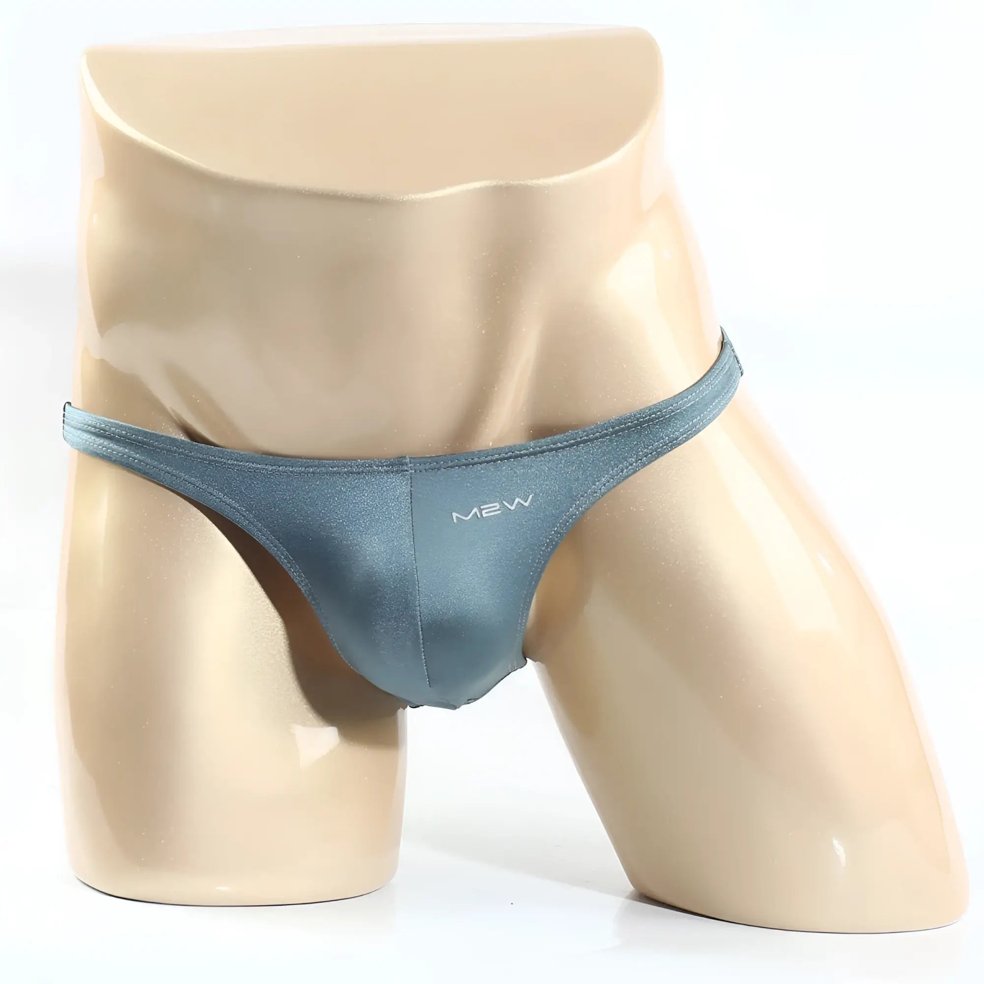 A sleek teal metro malewear monaco bikini thong made of smooth shiny fabric shown from the front