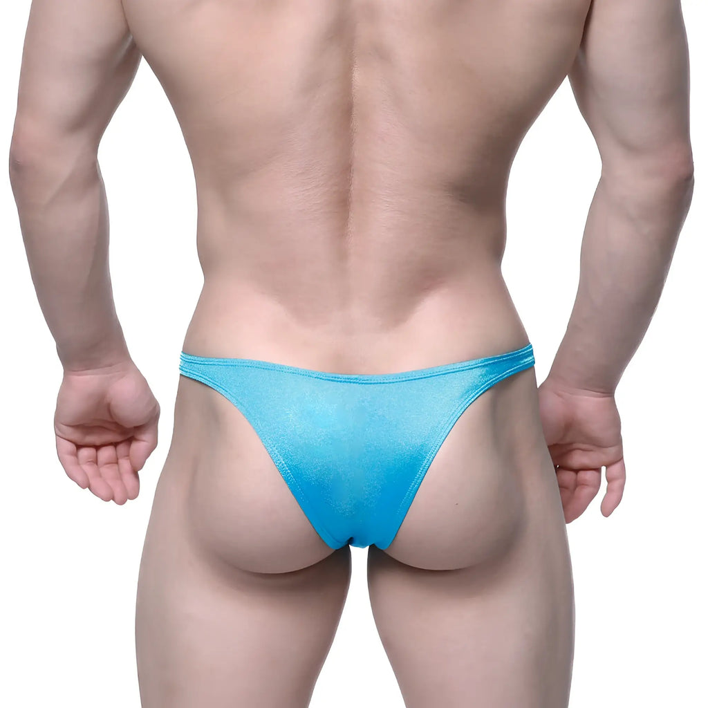 A vibrant blue shimmering fabric thong with smooth slightly translucent texture metro malewear monaco bikini turquoise