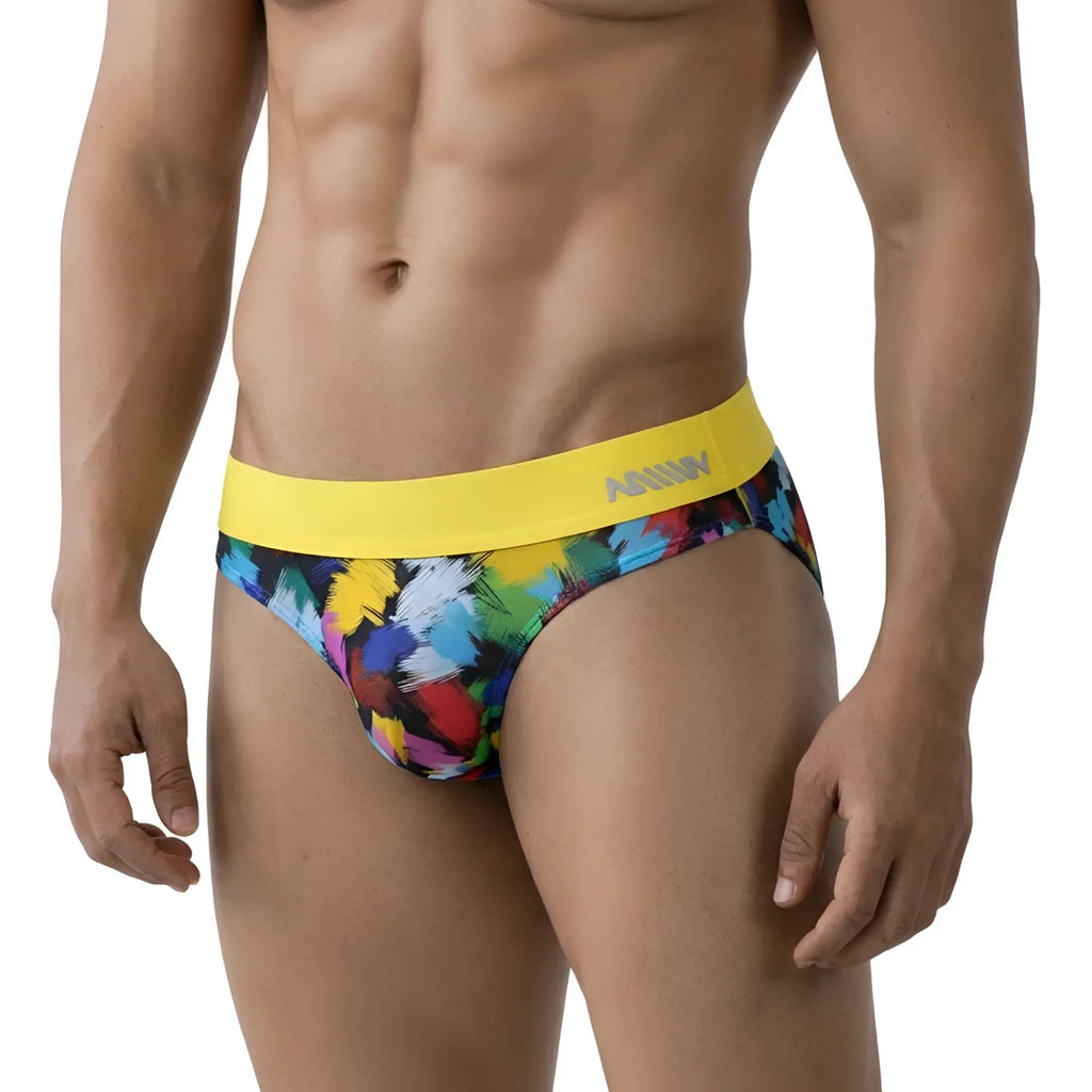 MetroMaleWear Nasca brief yellow with vibrant abstract paint-splatter pattern and bold yellow waistband featuring annn logo