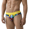 MetroMaleWear Nasca brief yellow with vibrant abstract paint-splatter pattern and bold yellow waistband featuring annn logo