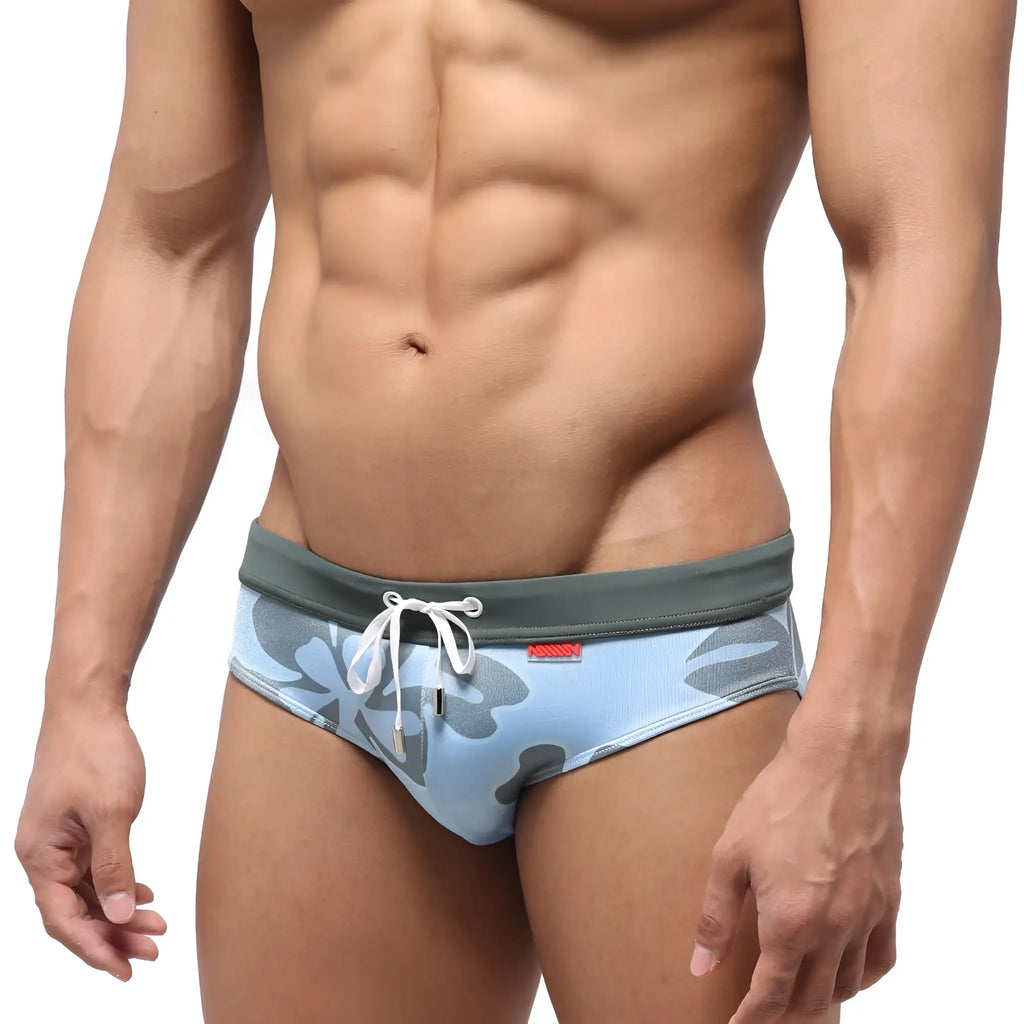 Light blue swim trunks with gray camouflage pattern and white drawstring waistband from MetroMaleWear Nature Swim Brief 4916-52