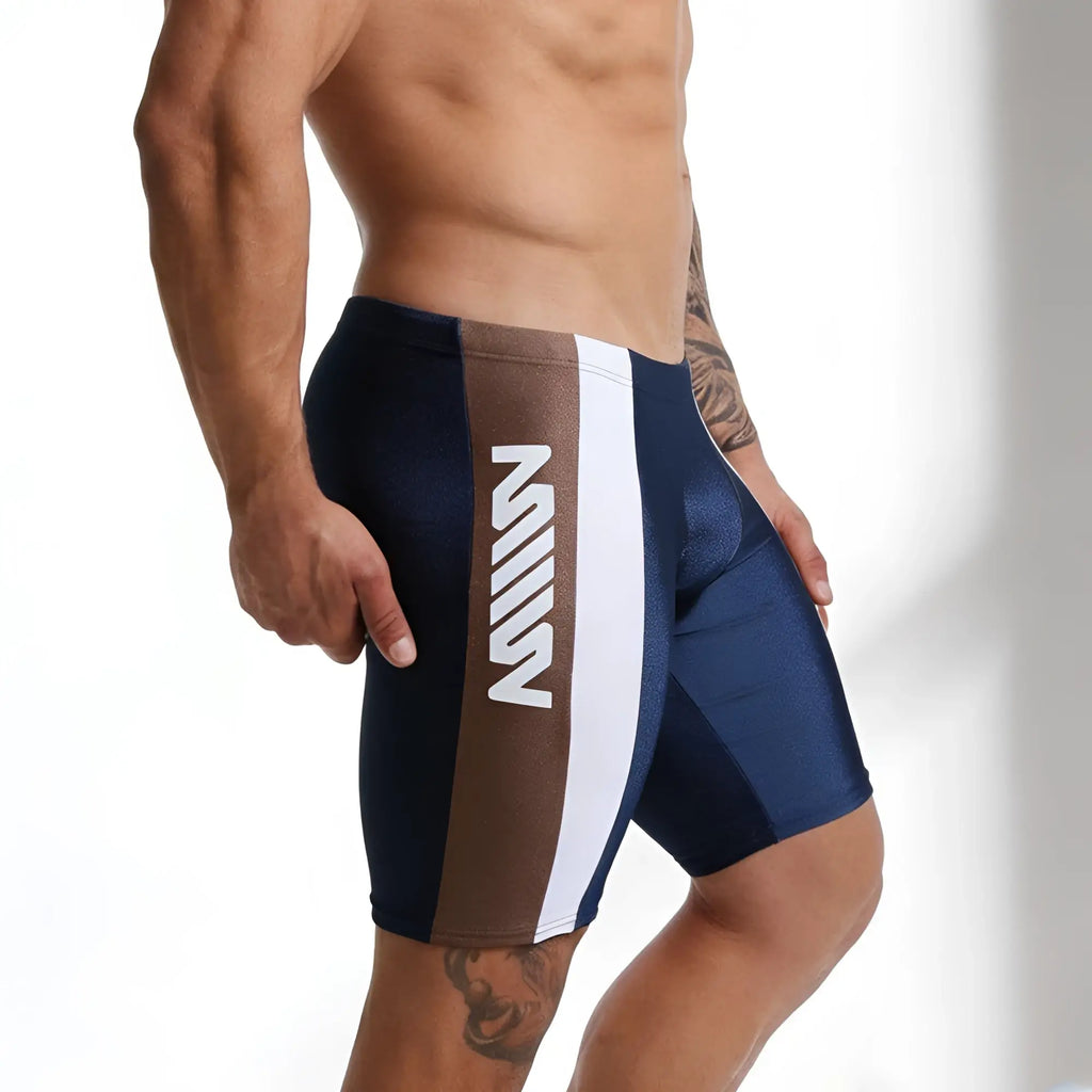 Navy blue and brown metro malewear new jammer swim boxer with white vertical stripe and bold m logo