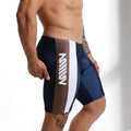Navy blue and brown metro malewear new jammer swim boxer with white vertical stripe and bold m logo