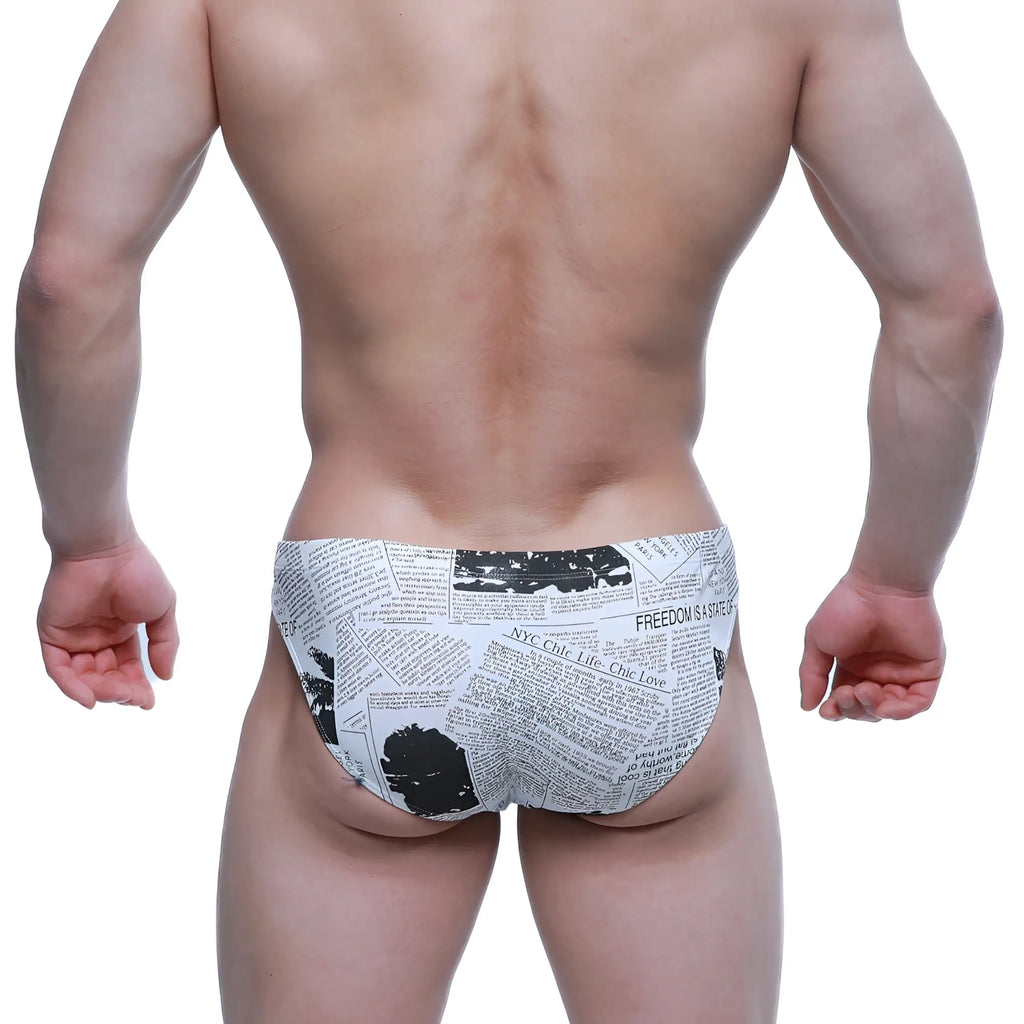 Black and white newspaper print swim trunks by metromalewear model 5103-m78 designed for swimwear use