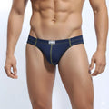 Navy blue denim-style briefs with lime green stitching and white brand label on waistband metroMalewear NUCLEO bikini