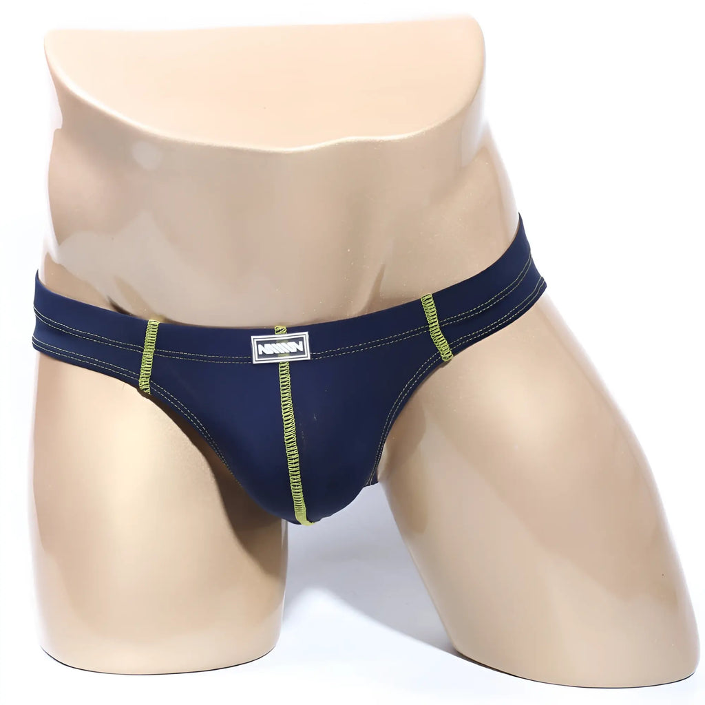Nixon brand navy blue briefs with lime green stitching and a white logo patch from MetroMaleWear NUCLEO bikini series