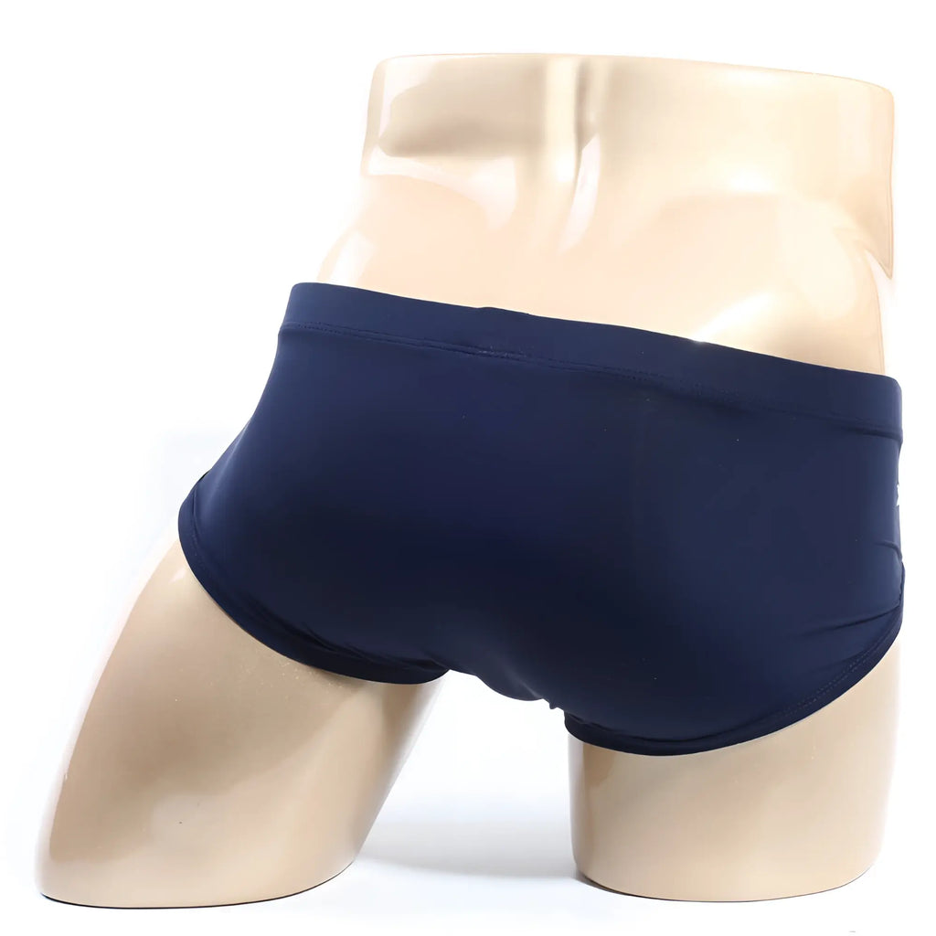 Navy blue metro malewear ortiz brief swim trunks with smooth stretchy fabric finish designed for comfort and performance