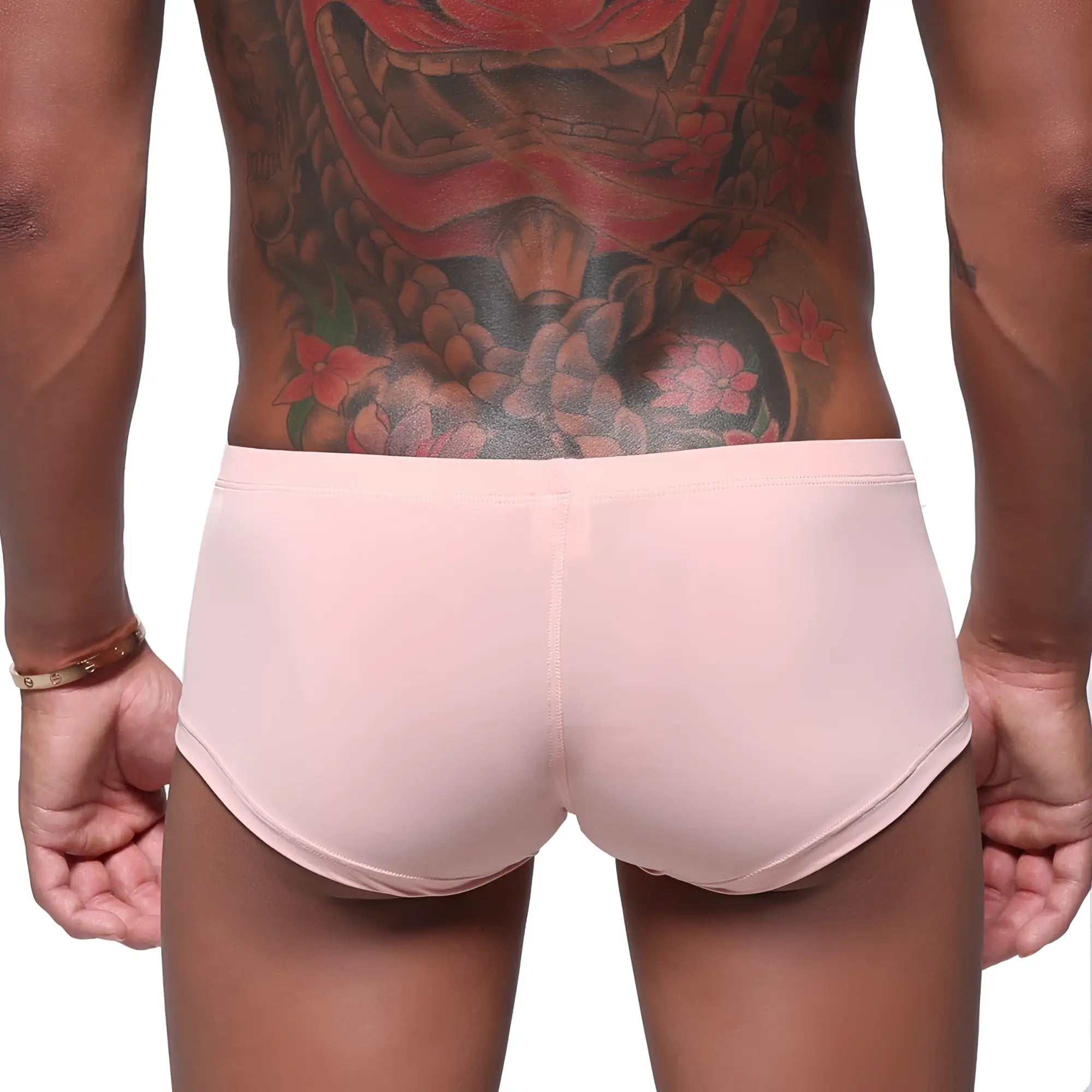 Pink athletic briefs by metromalewear featuring smooth form-fitting fabric and minimalist design in dusty pink
