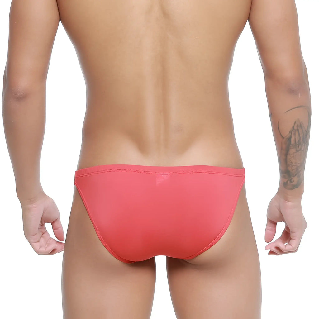 A sleek coral-red swim trunk by MetroMaleWear Paleta bikini 3604-13 with smooth form-fitting design