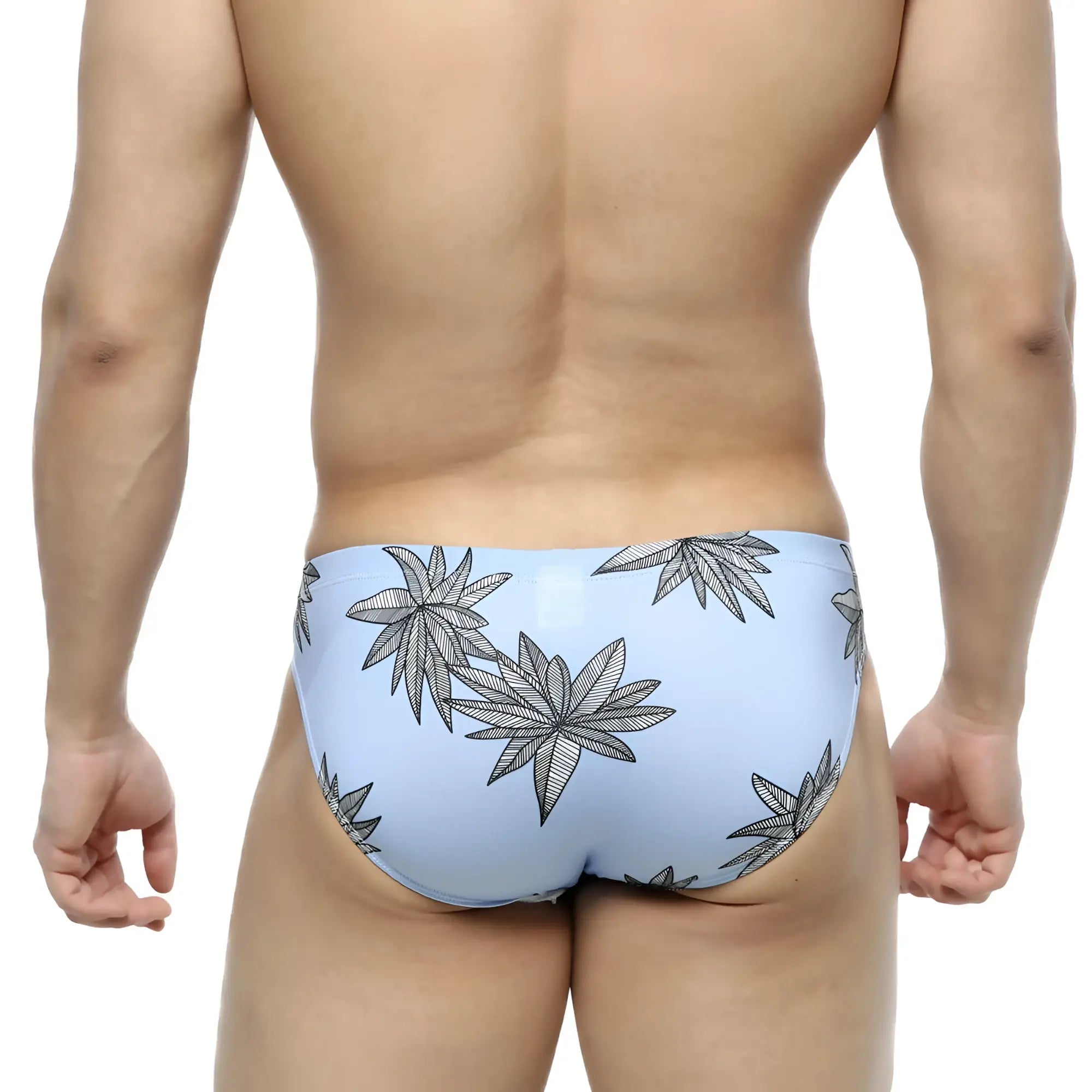 Light blue metro male wear palma bikini 5103-49 swim trunks with bold black leaf pattern for casual beachwear