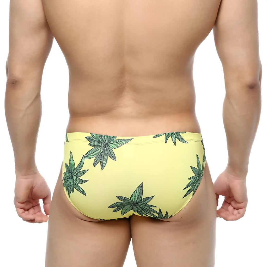 Yellow metro malewear palmera bikini 5103-37 swim trunks with bold green cannabis leaf pattern for casual beachwear