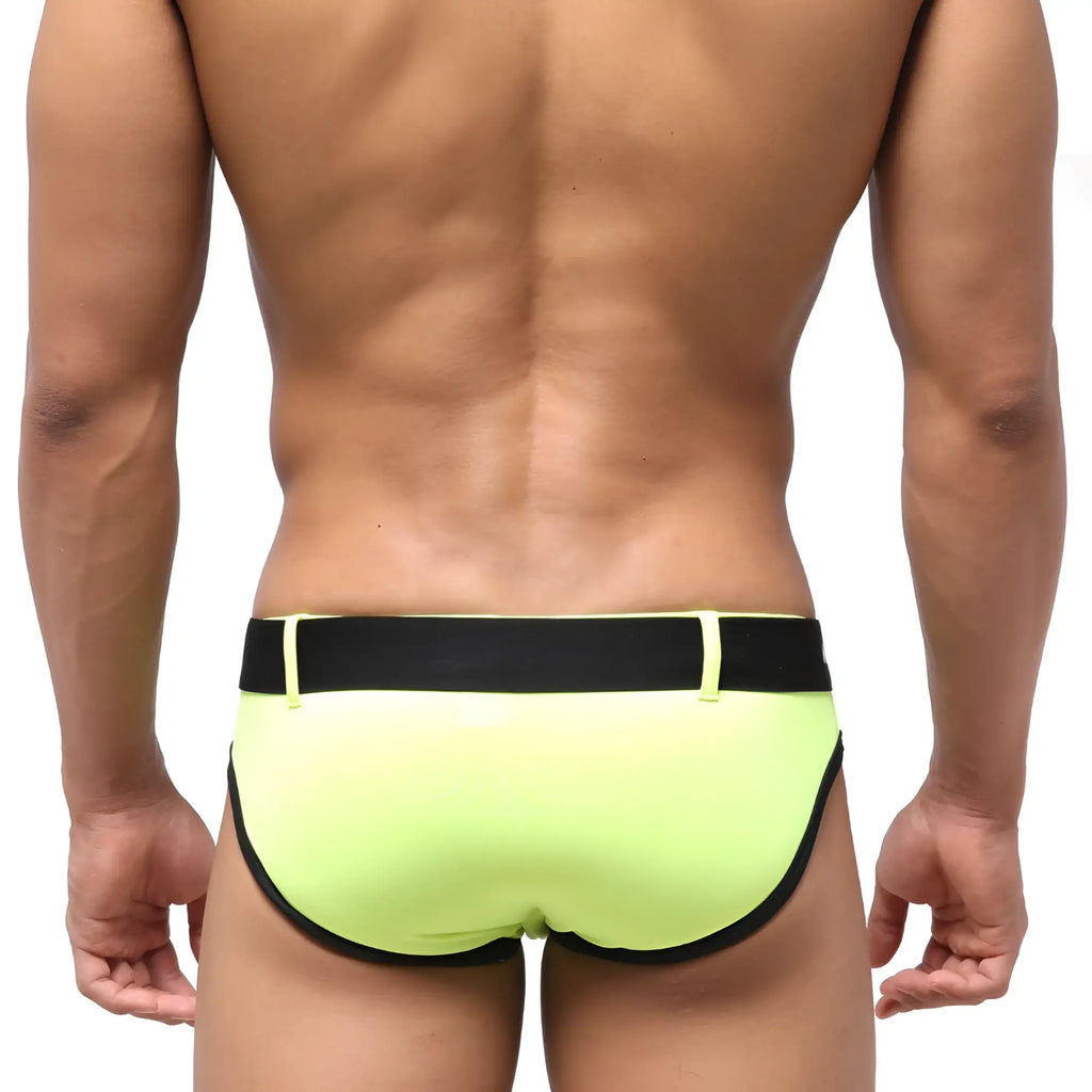 Neon green swim trunks with black elastic waistband and trim metroMalewear patagonia swim brief for swimming