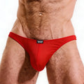 Red form-fitting cotton thong with black logo patch on waistband from MetroMaleWear perfect scene line