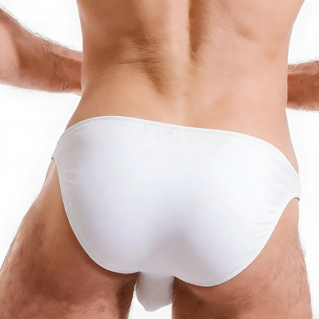 White smooth-textured cotton bikini swim trunks with sleek minimalist design from MetroMaleWear perfect scene