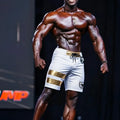 MetroMaleWear Physique board short corona 4706-36 white with gold stripes and black logo on left leg with drawstring waistband
