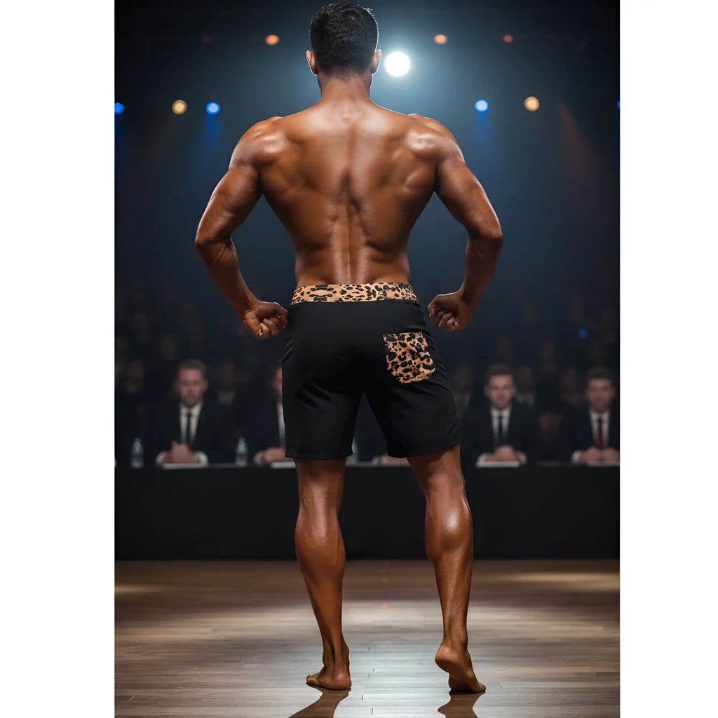 Black MetroMaleWear physique board shorts with leopard print waistband and pocket for casual beachwear