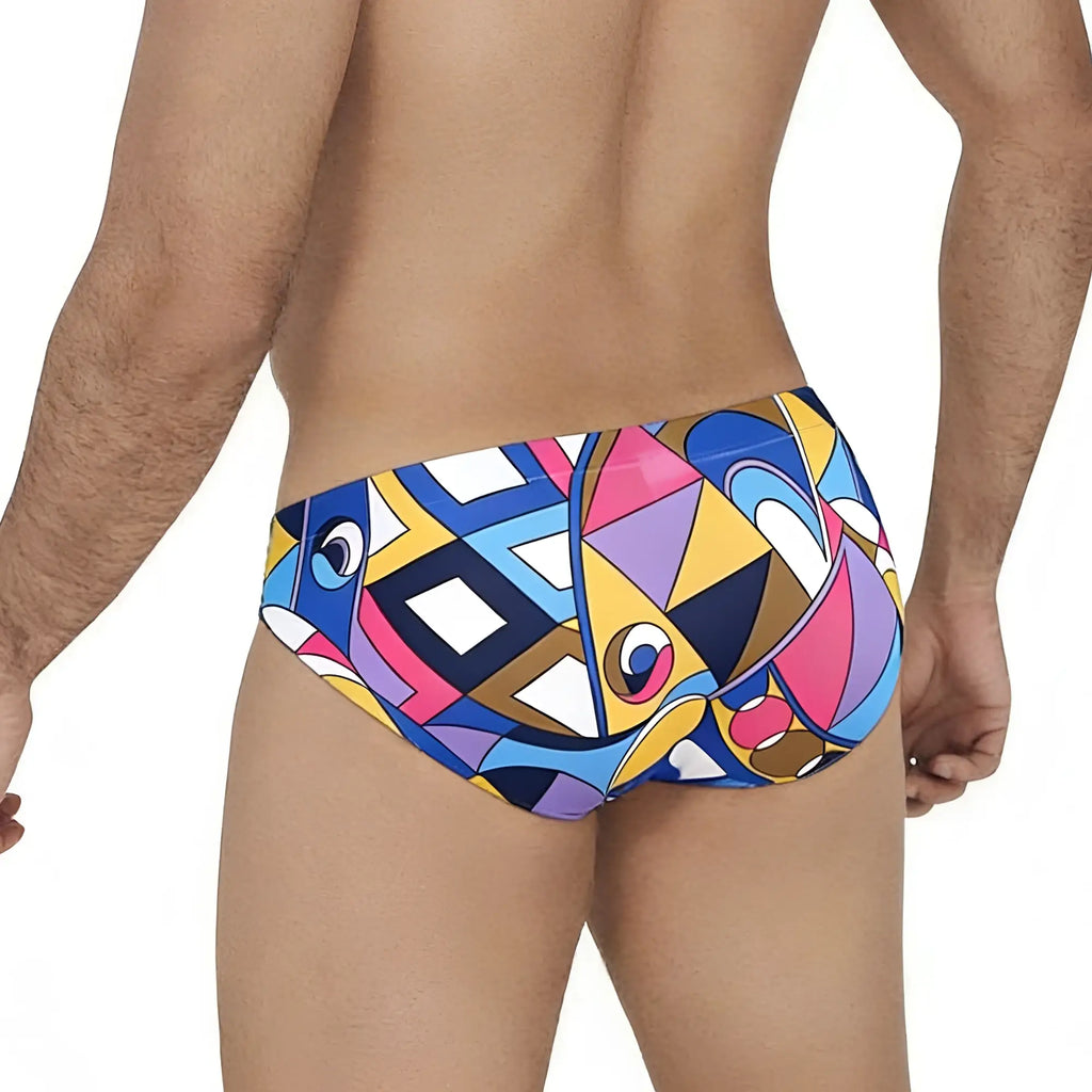 MetroMaleWear Picasso Bikini 5103-M87 swim trunks with vibrant geometric pattern in bold blues pinks yellows and purples