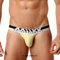 Yellow metromalewear pima cotton hip thong briefs with black and white striped waistband featuring brand name