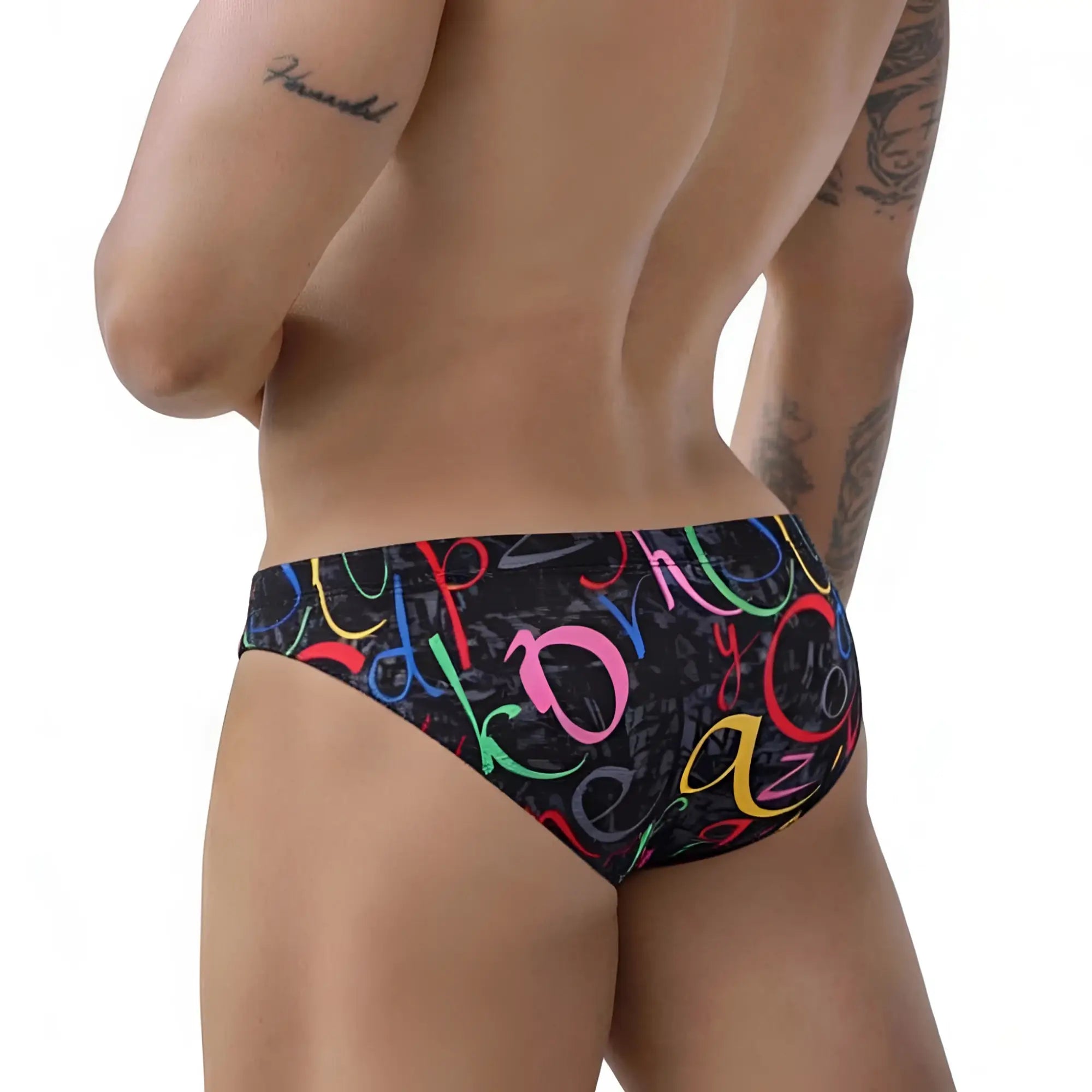 Black swim trunks by metromalewear pinaculo bikini 5103-m85 with vibrant multicolored graffiti lettering pattern