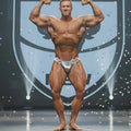 Shiny silver patterned competition briefs with number 34 for posing by metromalewear dog tag posing suit