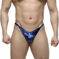 Blue velvet thong posing suit by metromalewear with shimmering textured finish for ifbb pro posing use