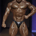 Black shiny latex briefs from MetroMaleWear PosingWear metallic navy posing suit front view