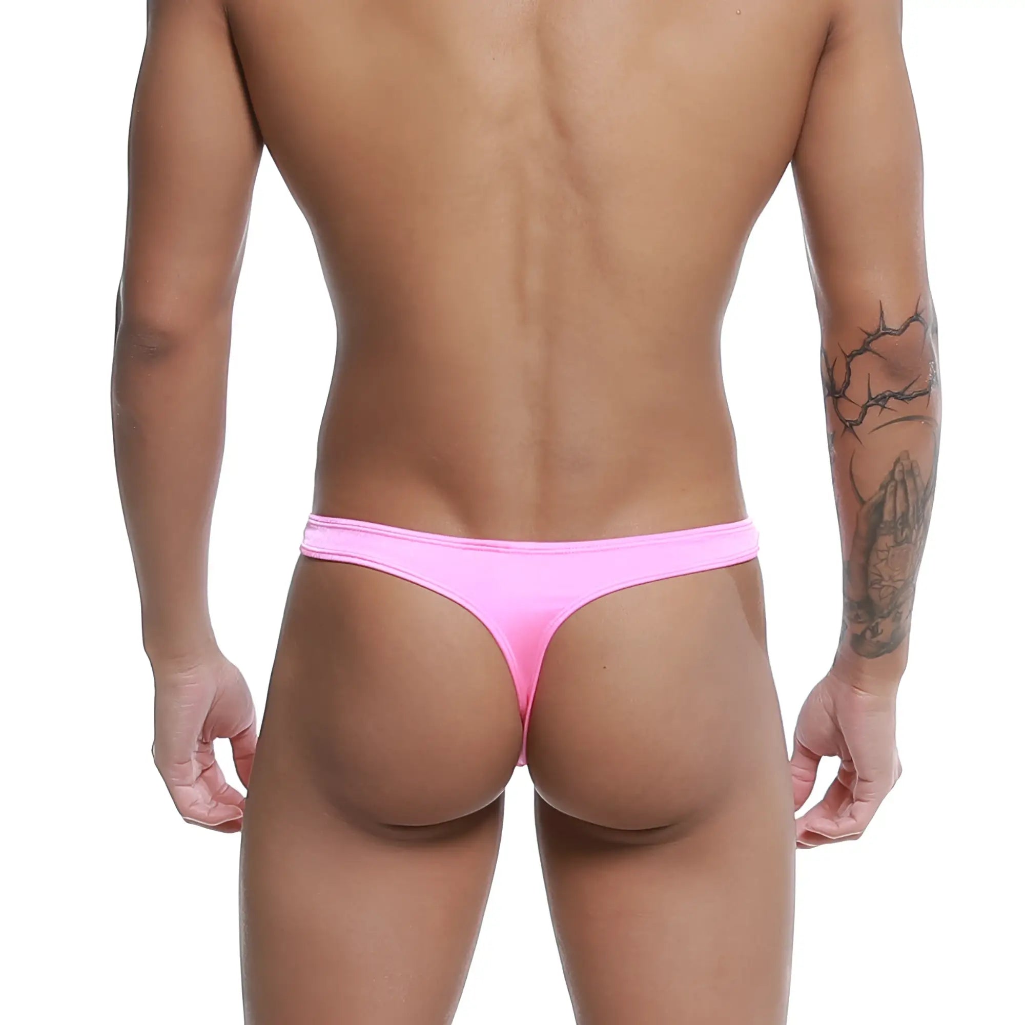 A vibrant pink form-fitting MetroMaleWear pouch thong made of smooth stretchy fabric shown from the back side
