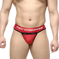 Red and black metromalewear prado thong with bold logo band visible on front in stretch fabric