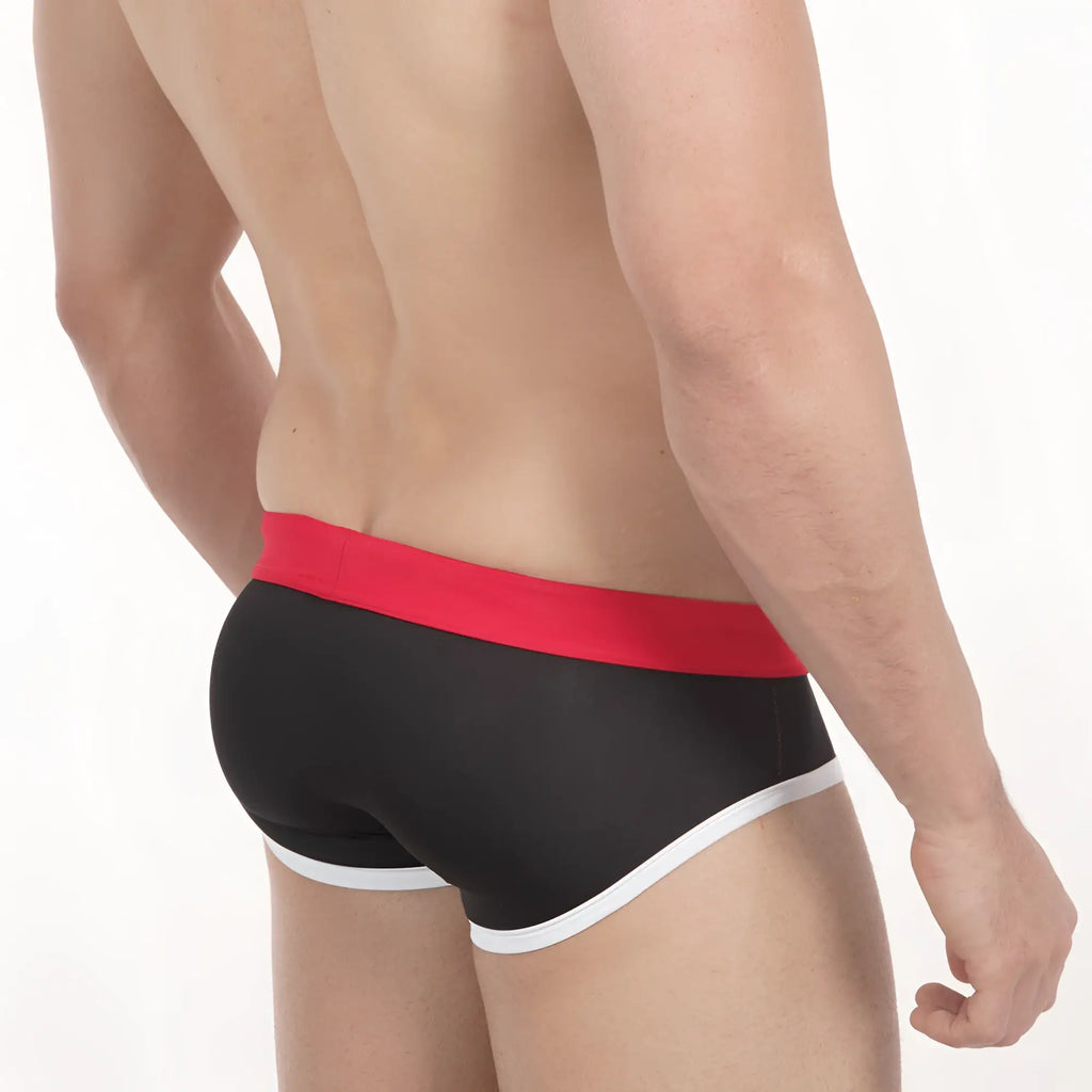 Black briefs with bold red waistband and white trim metroMalewear pride swim brief 4916-78 front view