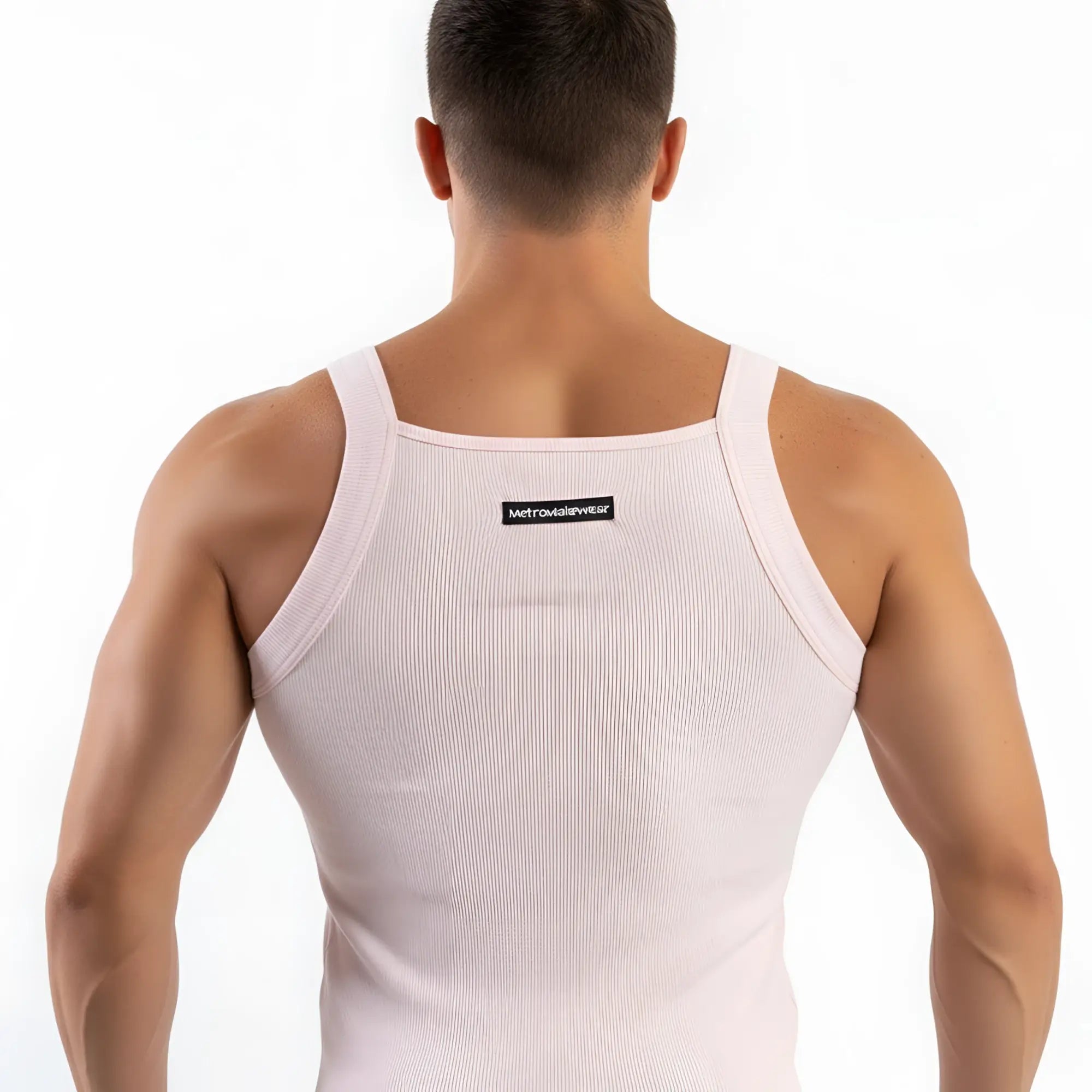 White ribbed tank top with thin straps and small black label at the back from metromalewear primo pink 3125-02