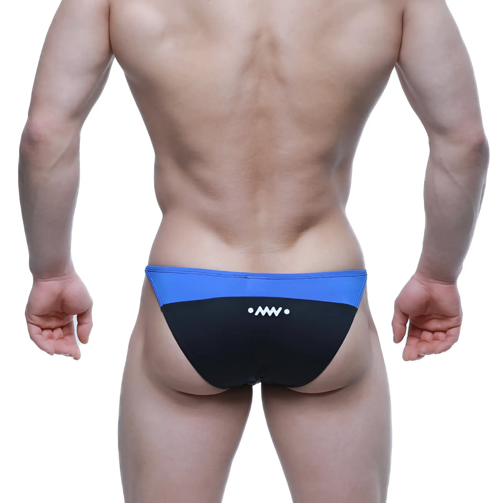 Back view of metro male wear prodigy bikini royal 6504-18 swim trunks in blue and black with white logo