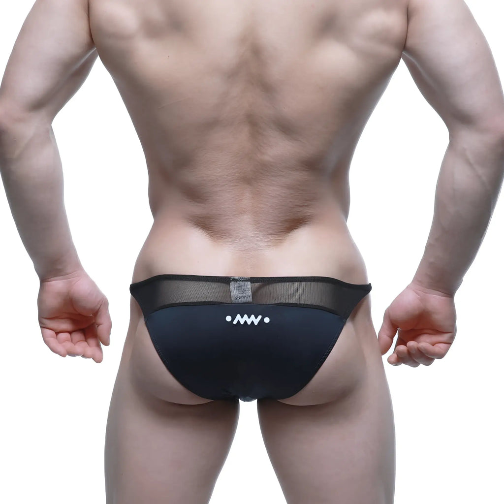 Black mesh briefs with a white logo on the front from MetroMaleWear Prodigy Bikini Tull 6504-71 collection