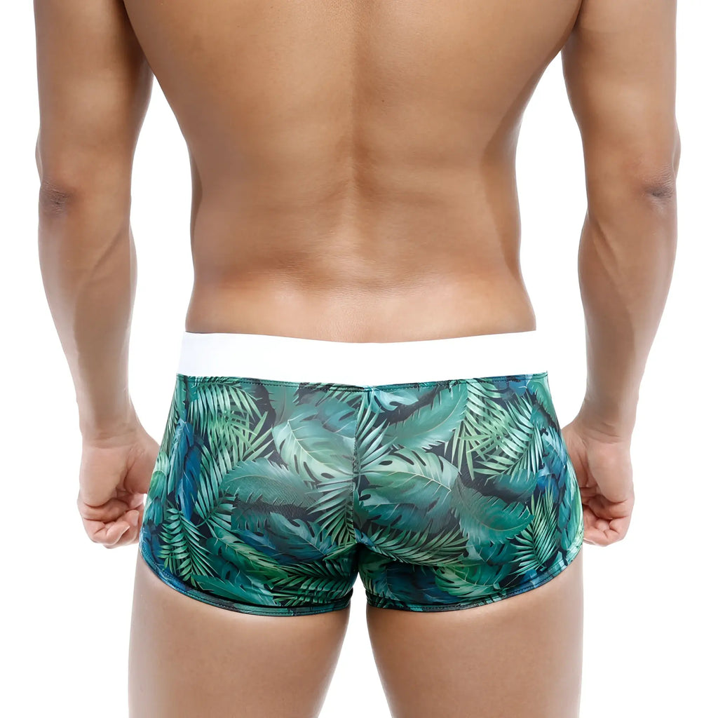 Green tropical leaf-patterned swim boxer briefs with white waistband from metromalewear Profundo collection
