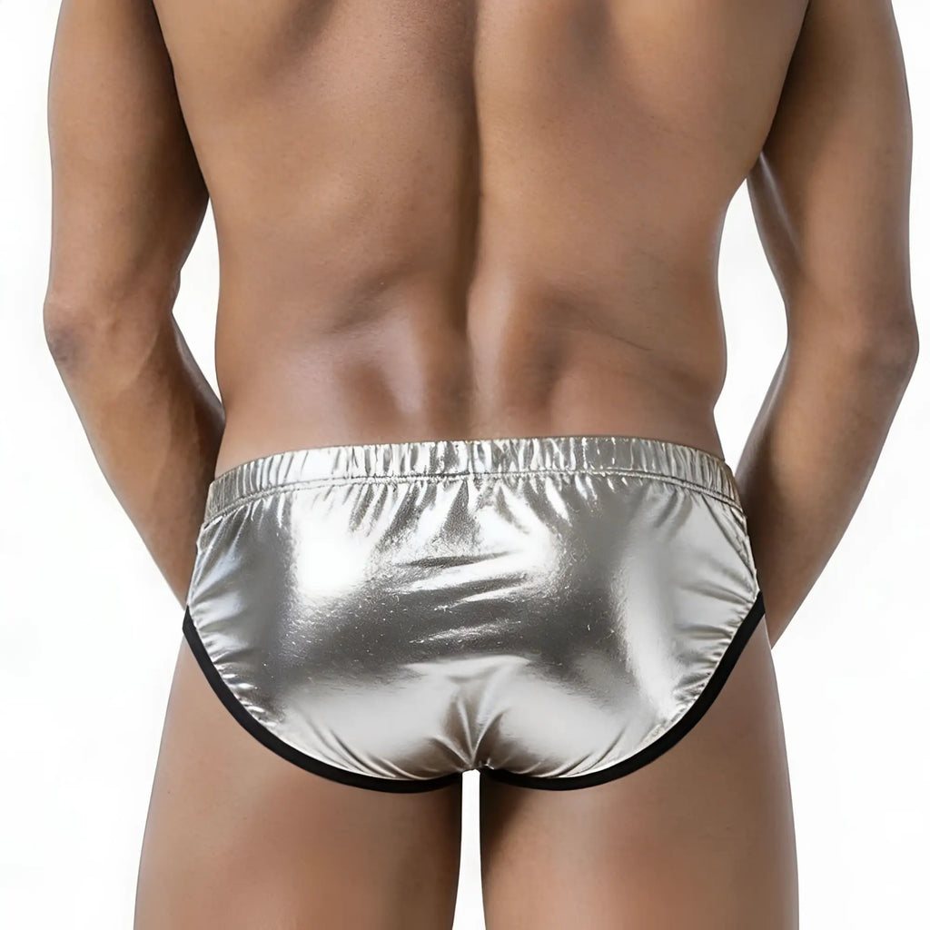 Shiny silver metallic briefs with black trim from metromalewear puente bikini metalic silver 3603-m10 product line