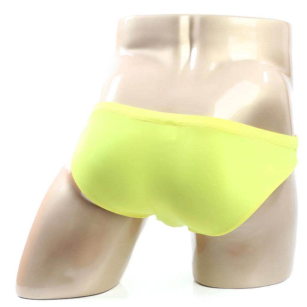 Bright neon yellow briefs displayed on a mannequin from MetroMaleWear Puente Bikini Oro 3603-15 collection