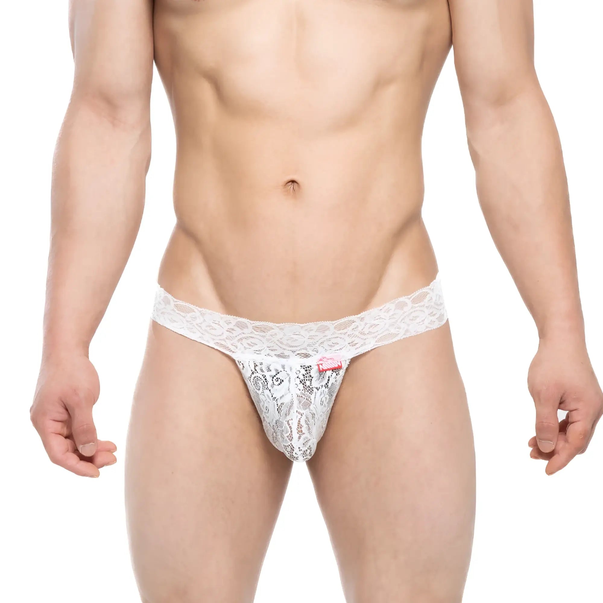 MetroMaleWear Reina G-String white lace thong with intricate floral patterns and a small red tag on the front