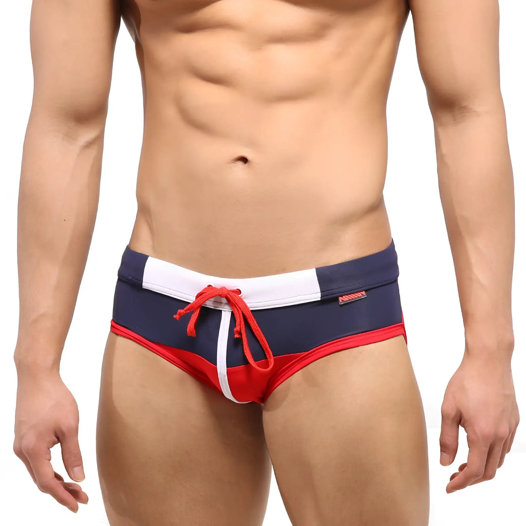 MetroMaleWear Reno swim brief red 4962-12 with navy blue and red colors, white trim, and a matching red drawstring