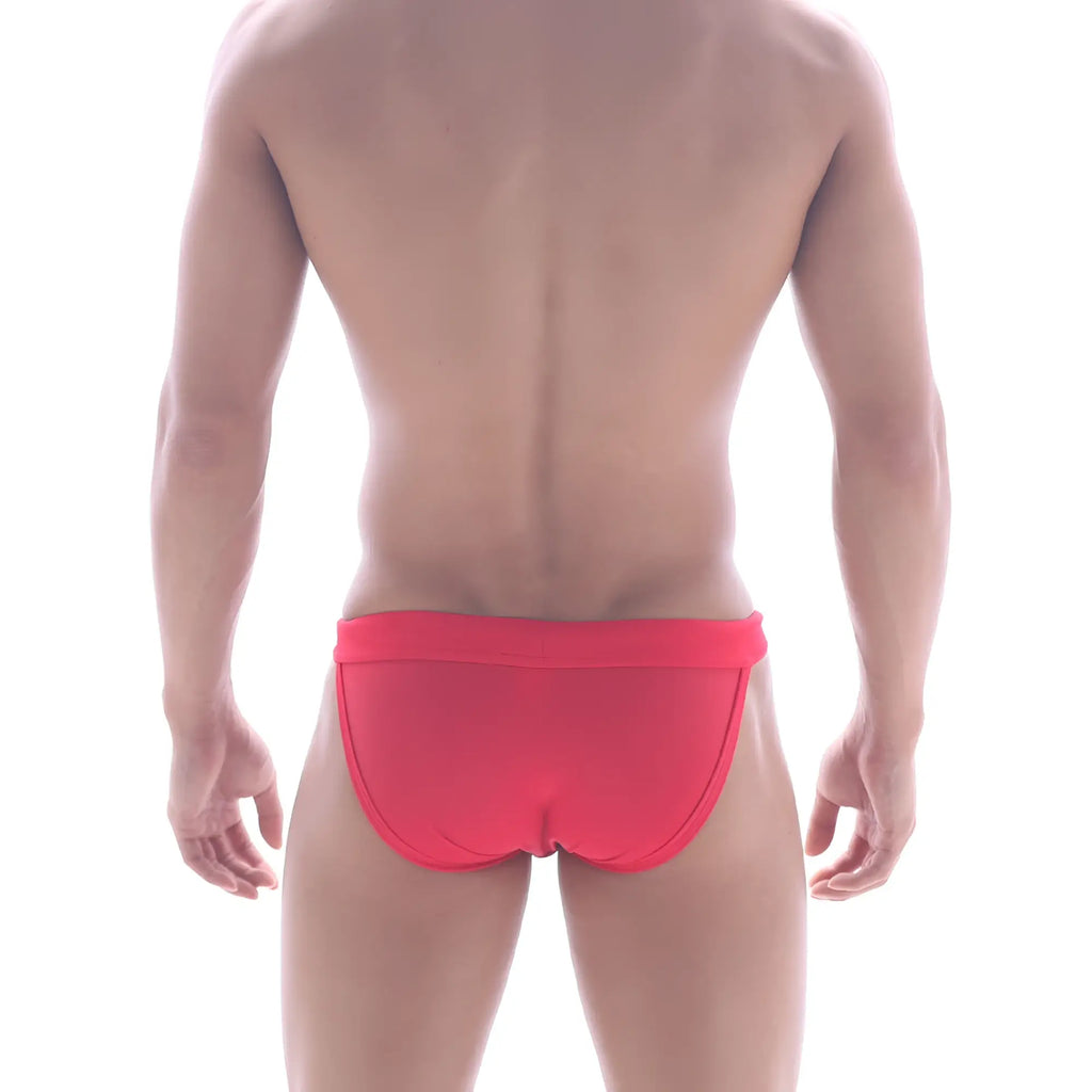 Bright red form-fitting swim bikini trunks with smooth fabric and contoured design by MetroMaleWear Rio America