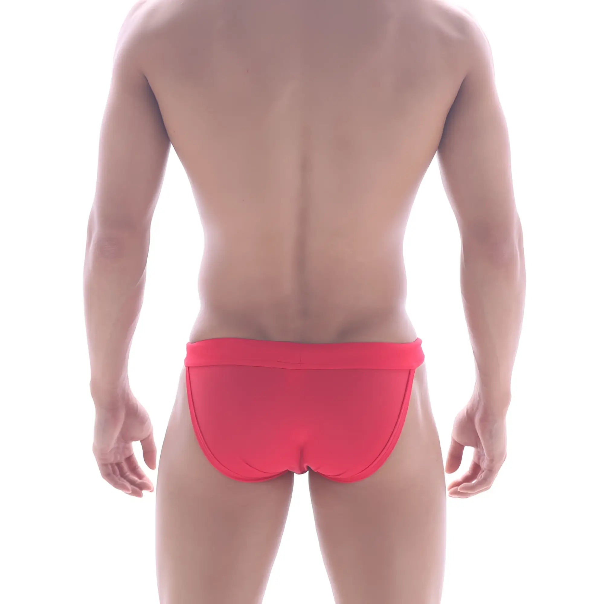 Bright red form-fitting swim bikini trunks with smooth fabric and contoured design by MetroMaleWear Rio America