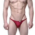 Red metallic-textured thong with small white metro malewear brand tag from romantic bikini burgundy 6008-29 collection