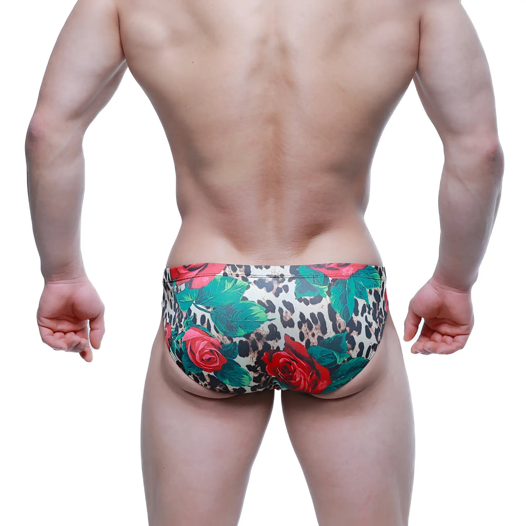 MetroMaleWear Rosee Bikini 5103-M81 featuring vibrant red roses and green leaves on bold leopard-print swim trunks