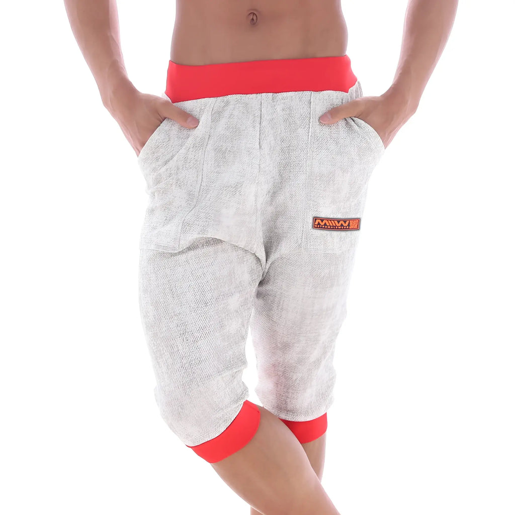 Gray heathered metroMalewear Scandinavia capri pants with red elastic waistband cuffs and orange logo patch on thigh
