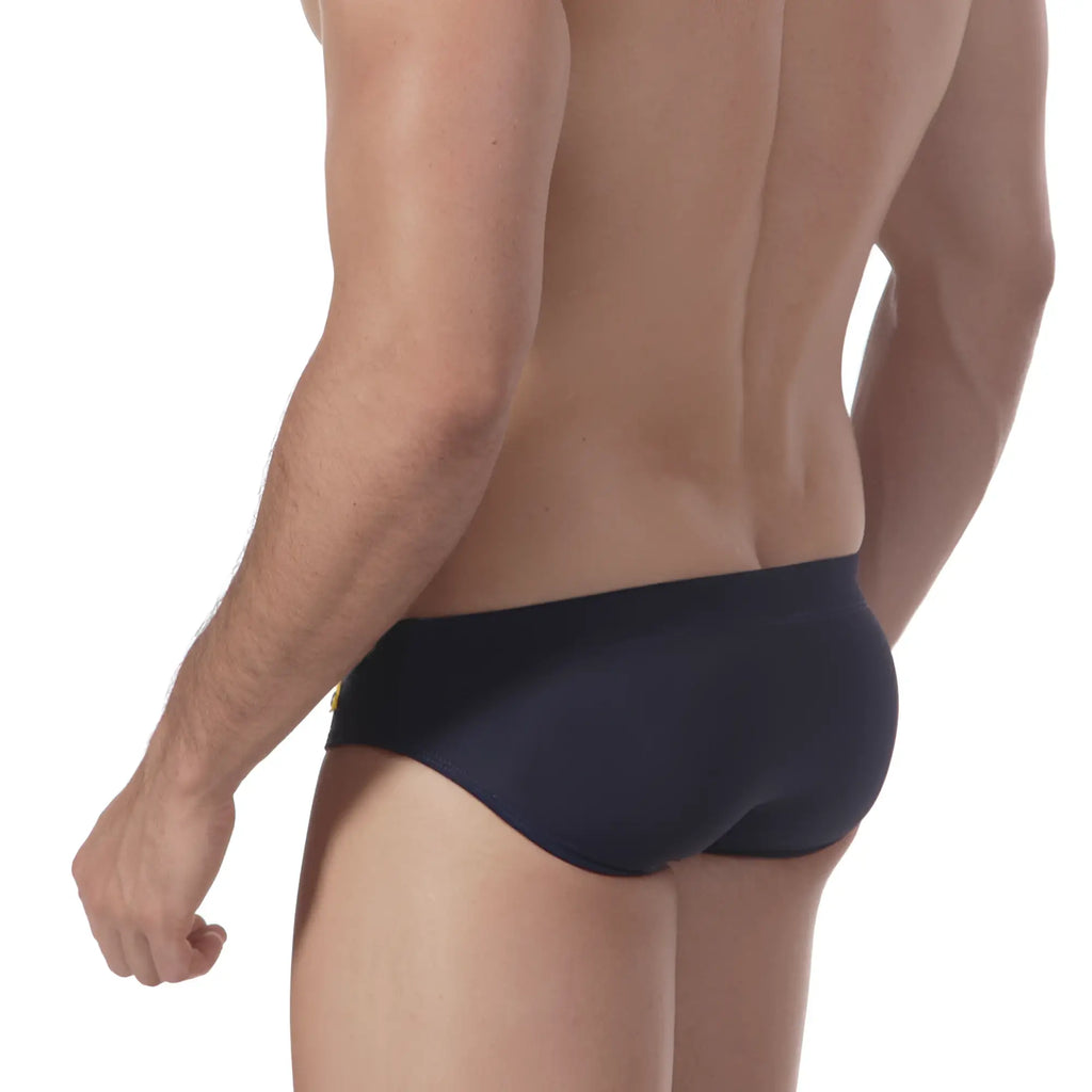 Navy blue MetroMaleWear Scottish swim brief with a small gold logo on the left hipband designed for swimming