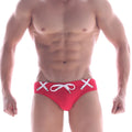 Red swim trunks with white x-shaped lace-up details and matching bow at front from metromalewear scottish swim brief