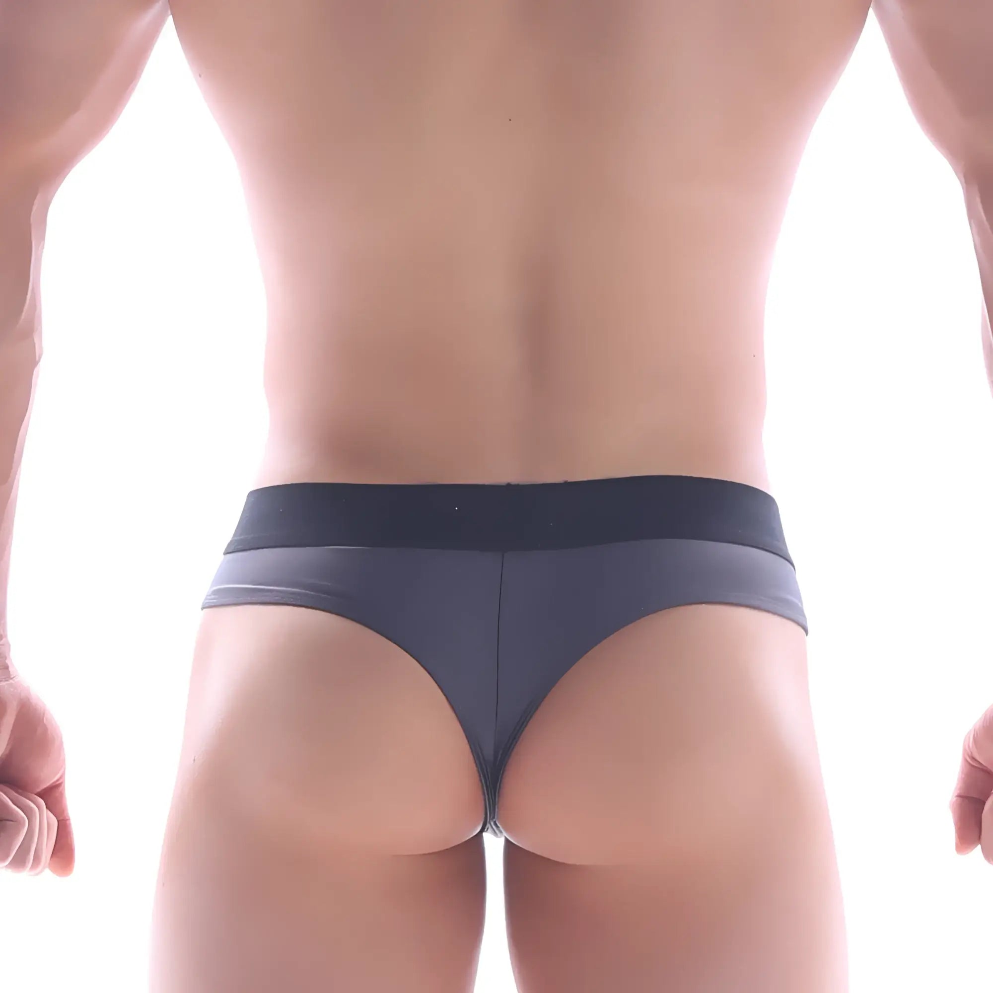 Dark gray sleek form-fitting thong with wide waistband from metromalewear snap thong charcoal 2212-11 shown from front