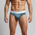 Teal mens briefs with a white elastic waistband featuring subtle metro malewear branding spark brief green 5006-07