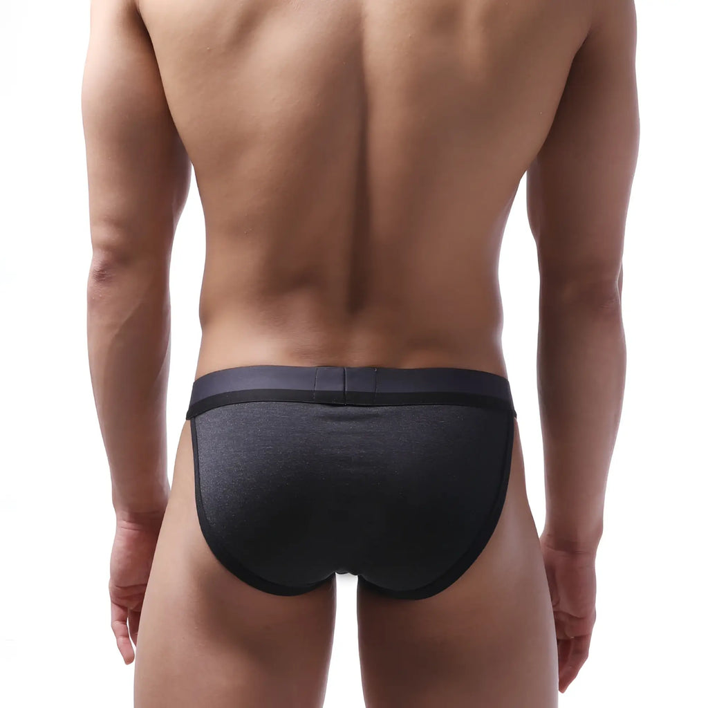 Black textured MetroMaleWear sport bikini briefs with smooth elastic waistband designed for activewear use